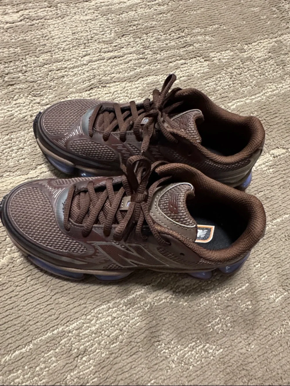 New Balance Women's Brown Athletic Shoes with Light Blue Cushioning